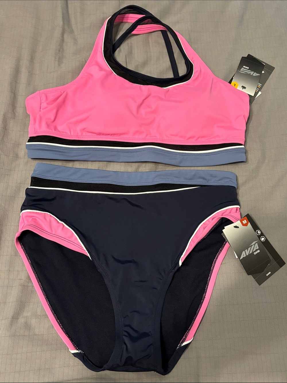 NWT Avia Swim bikini. Top size large, bottoms size medium. Pink blue